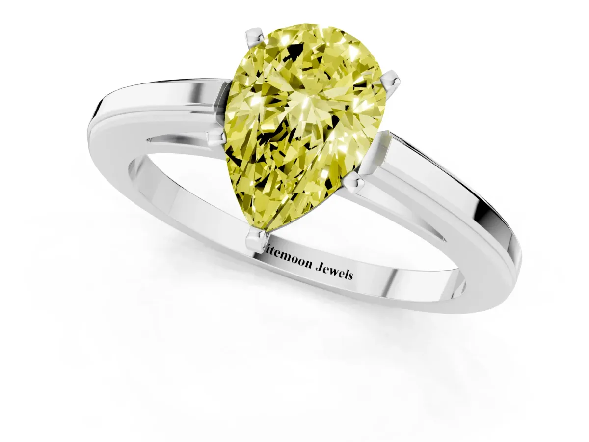 Fancy Yellow Pear Cut Solitaire Diamond Ring with Four-Prong Setting and Classic Band Platinum