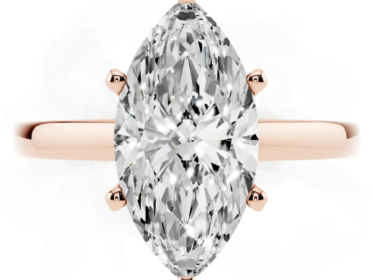 Marquise Cut Solitaire Diamond Engagement Ring with Four-Prong Setting on a Classic Band Rose gold