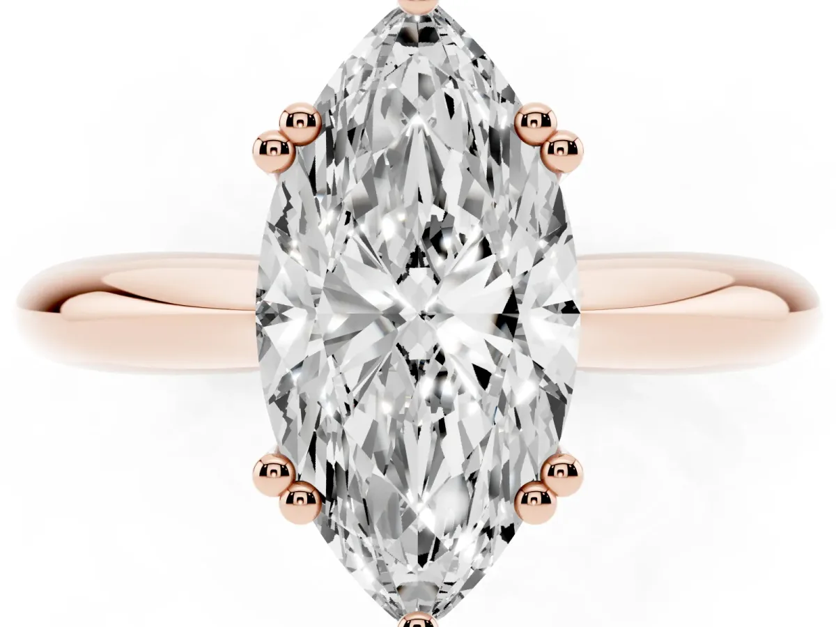 Marquise Cut Cut Solitaire Engagement Ring with Tapered Band and Four-Prong Setting Rose gold