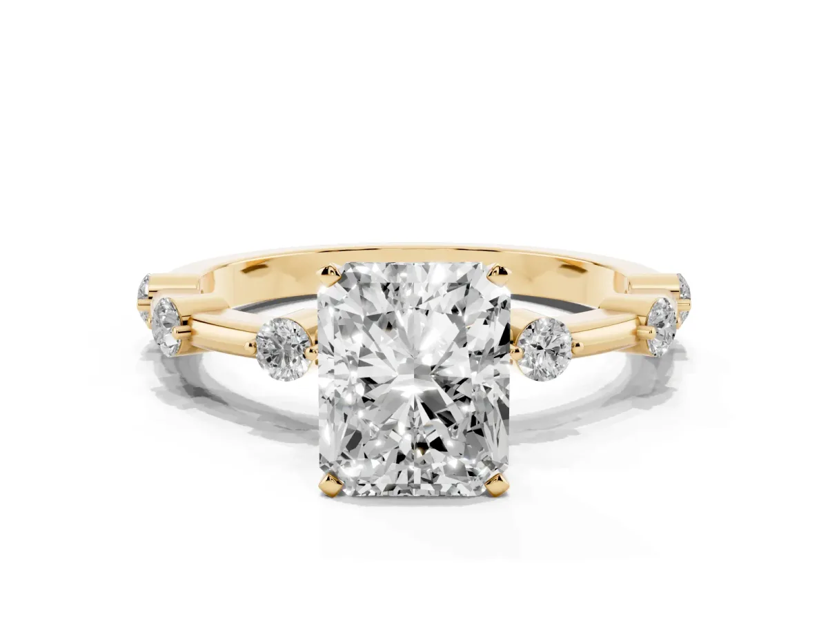Radiant Cut Solitaire Diamond Ring with Bezel Set Side Stones and Prong Setting Yellow gold