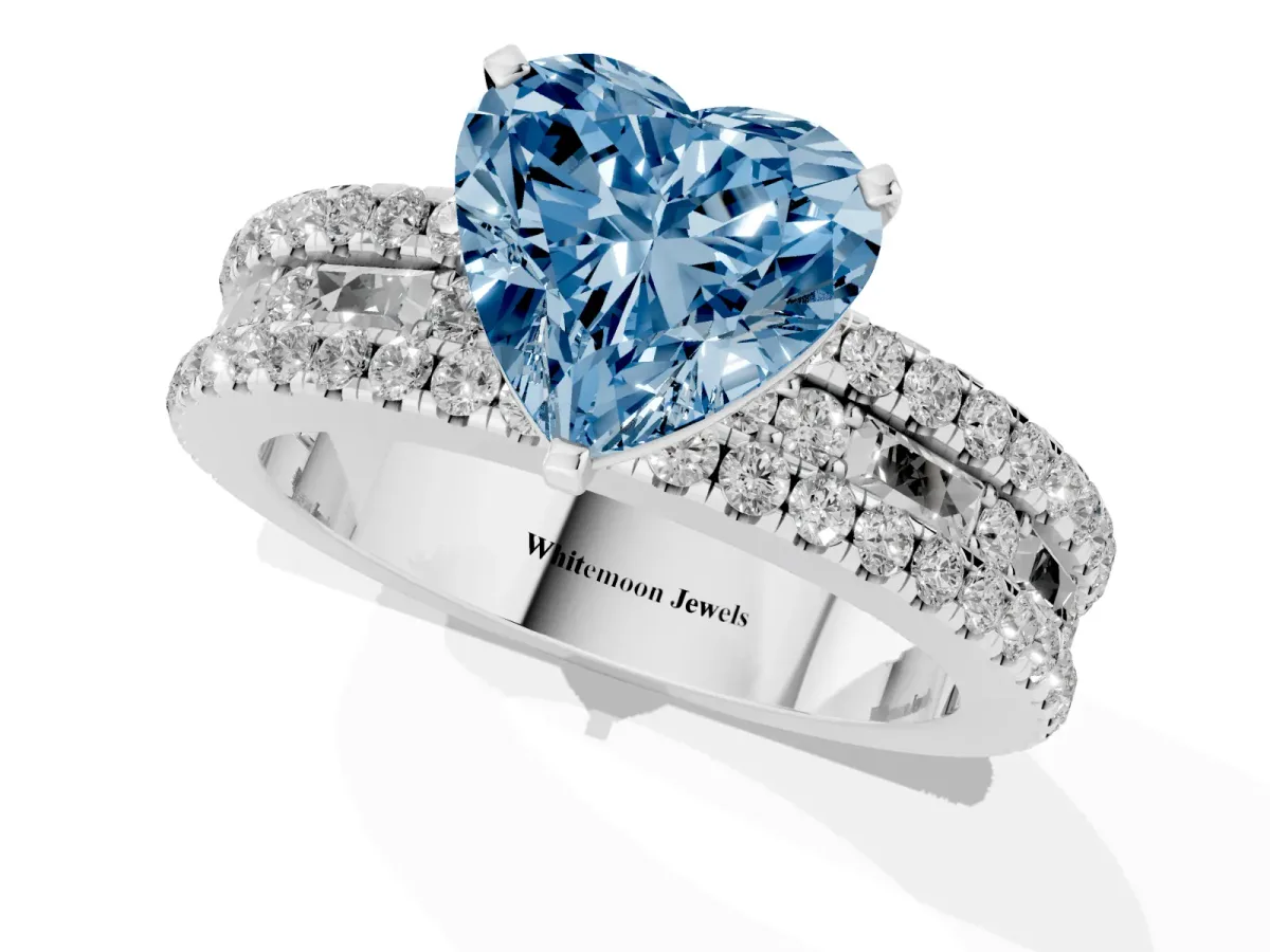 Fancy Blue Heart Cut Diamond Solitaire Ring with Pavé and Channel Set Band Platinum