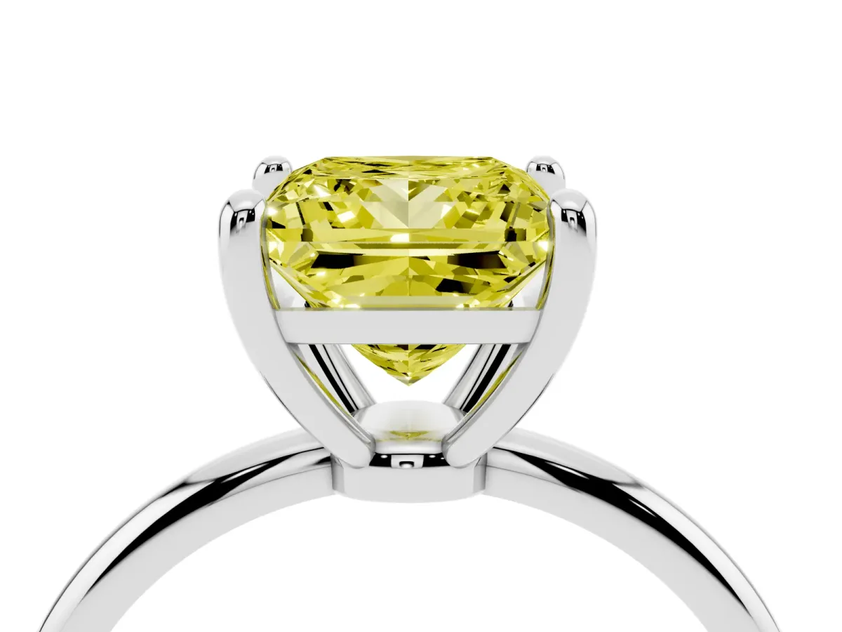 Fancy Yellow Princess Cut Solitaire Diamond Ring with 4-Prong Setting on a Classic Band Silver