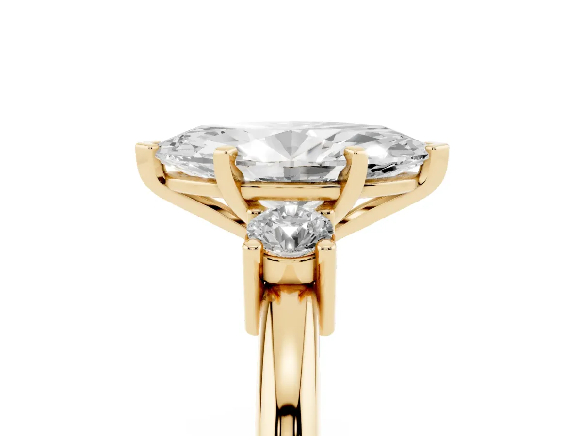 Three-Stone Marquise Cut Cut Diamond Solitaire with Prong Setting and Classic Band Yellow gold