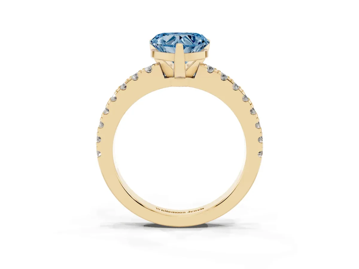 Fancy Blue Heart Cut Solitaire Diamond with Pavé Band and Four-Prong Setting Yellow gold