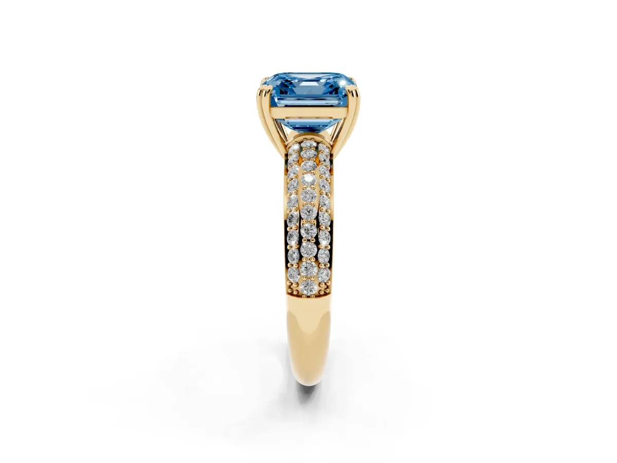 Fancy Blue Asscher Cut Diamond Solitaire Ring with Multi-Row Round Pavé Band and Prong Setting Yellow gold