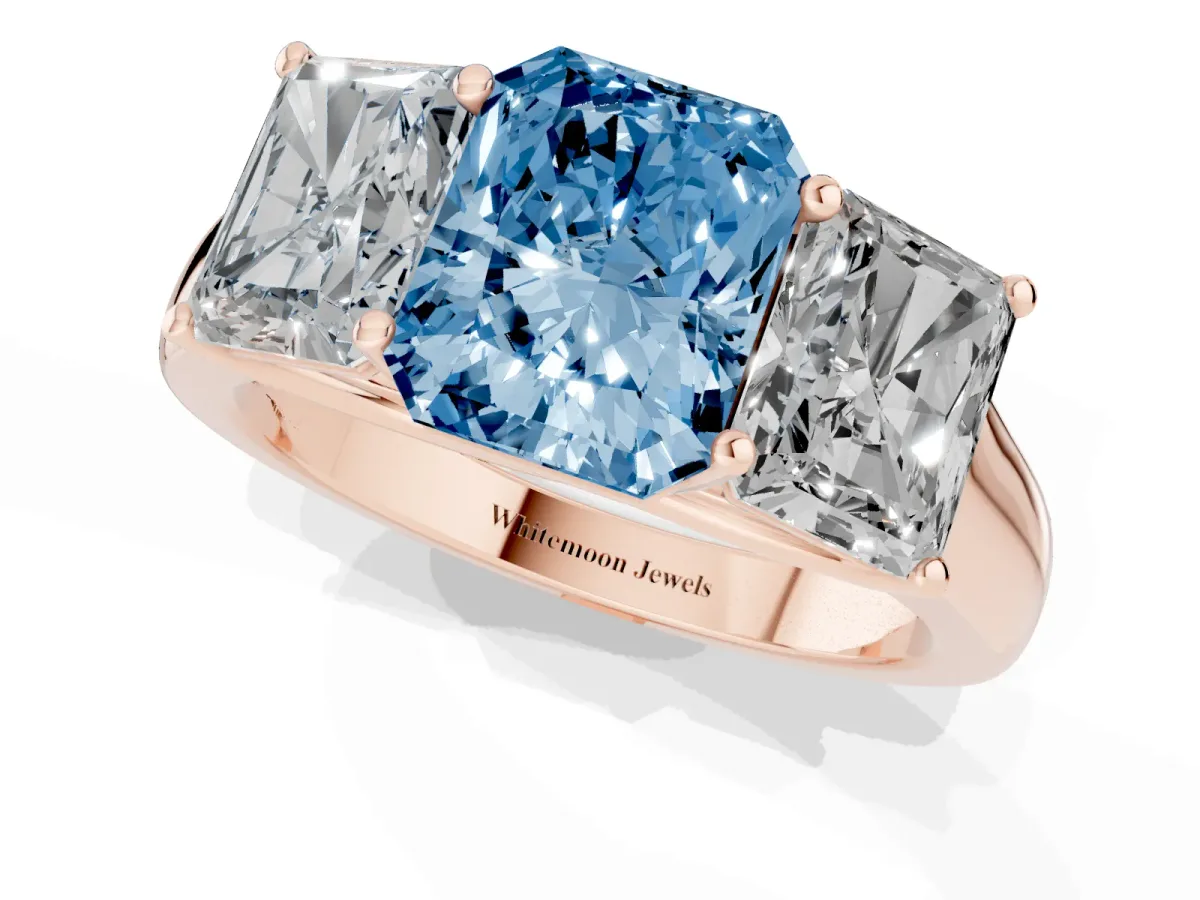 Fancy Blue Radiant Cut Three-Stone Diamond Ring with Prong Setting on a Classic Band Rose gold