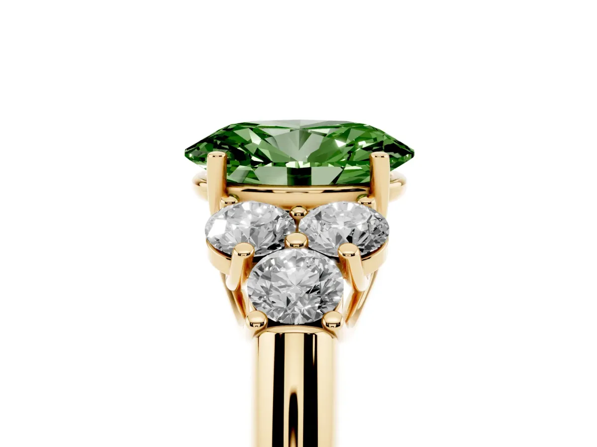 Fancy Green Oval Cut Cut Diamond Cluster Ring with Round Accent Stones and Prong Setting on a Classic Band Yellow gold