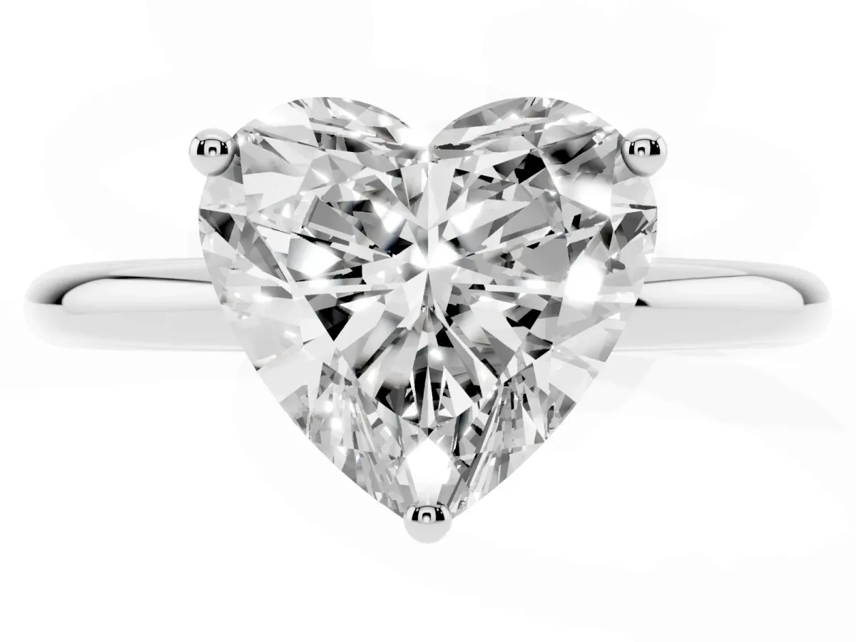 Heart Cut Cut Solitaire Engagement Ring with Four-Prong Setting and Classic Band Silver