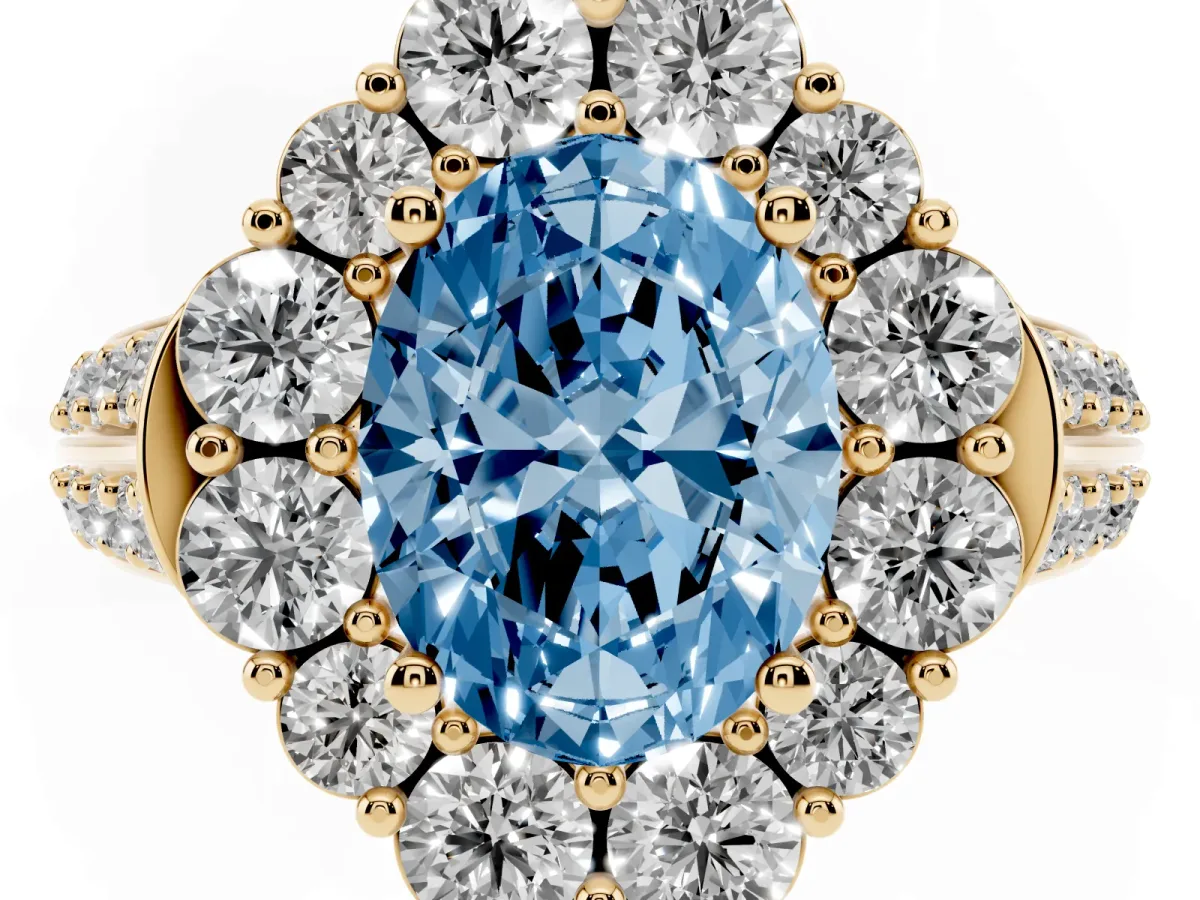 Fancy Blue Oval Cut Halo Diamond Engagement Ring with Split Shank and Prong Setting Yellow gold