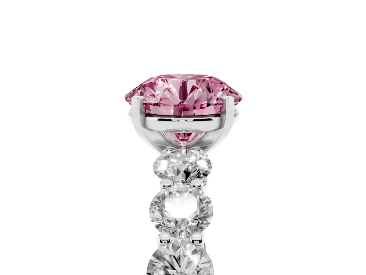 Fancy Pink Round Cut Diamond Prong Setting with Side Stones on a Pave Band Silver