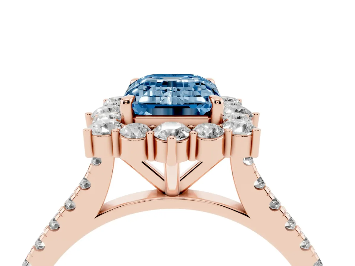 Fancy Blue Emerald Cut Halo Diamond Ring with Pavé Band and Prong Setting Rose gold