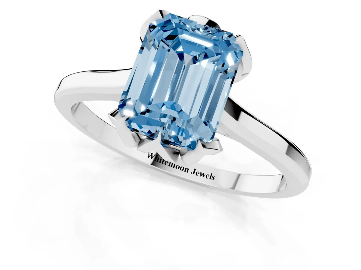 Fancy Blue Emerald Cut Diamond Solitaire Ring with Flower Prong Setting and Classic Band Silver
