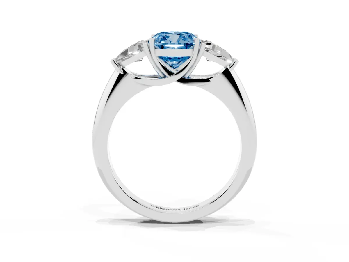 Fancy Blue Three-Stone Cushion Cut Diamond Engagement Ring with Trillion Side Stones and Prong Setting Silver