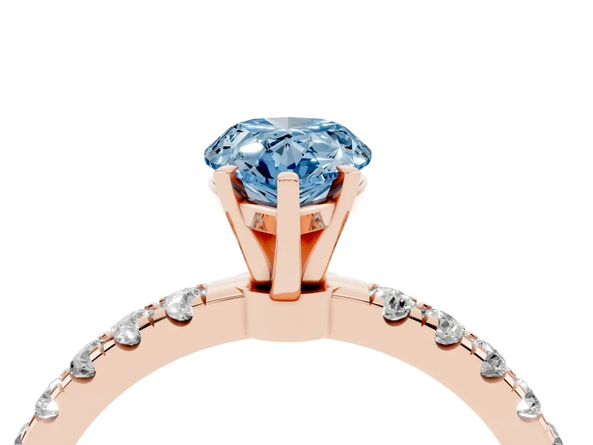 Fancy Blue Pear Cut Diamond Solitaire Ring with Pavé Accents and Four-Prong Setting Rose gold