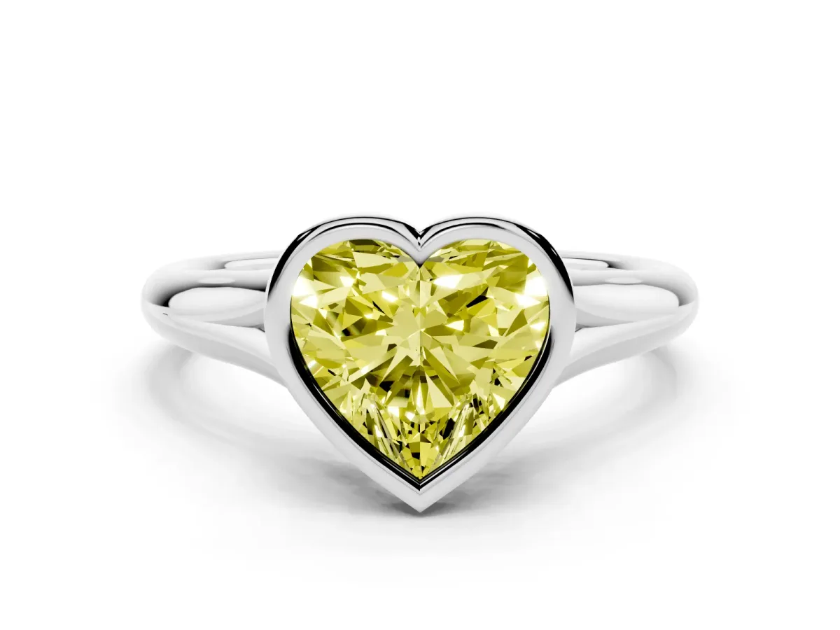 Fancy Yellow Bezel Set Heart Cut Solitaire Diamond Ring with Smooth Band Silver