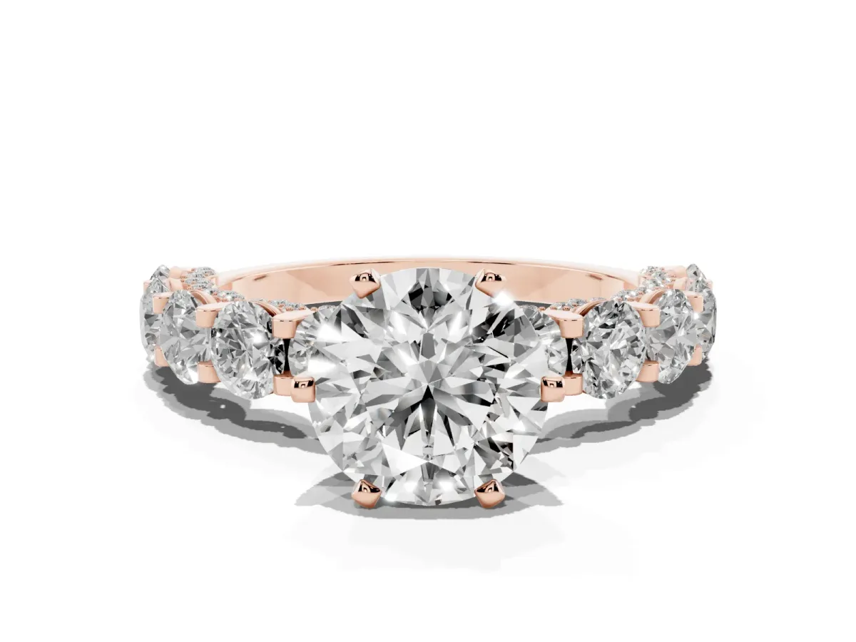 Round Cut Diamond Side Stone Engagement Ring with Four-Prong Setting Rose gold