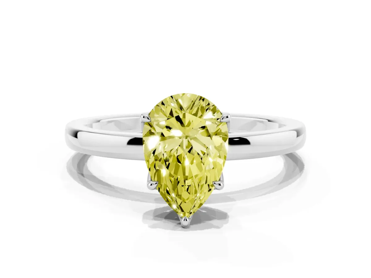 Fancy Yellow Pear Cut Diamond Solitaire Ring with Thin Band and Prong Setting Silver