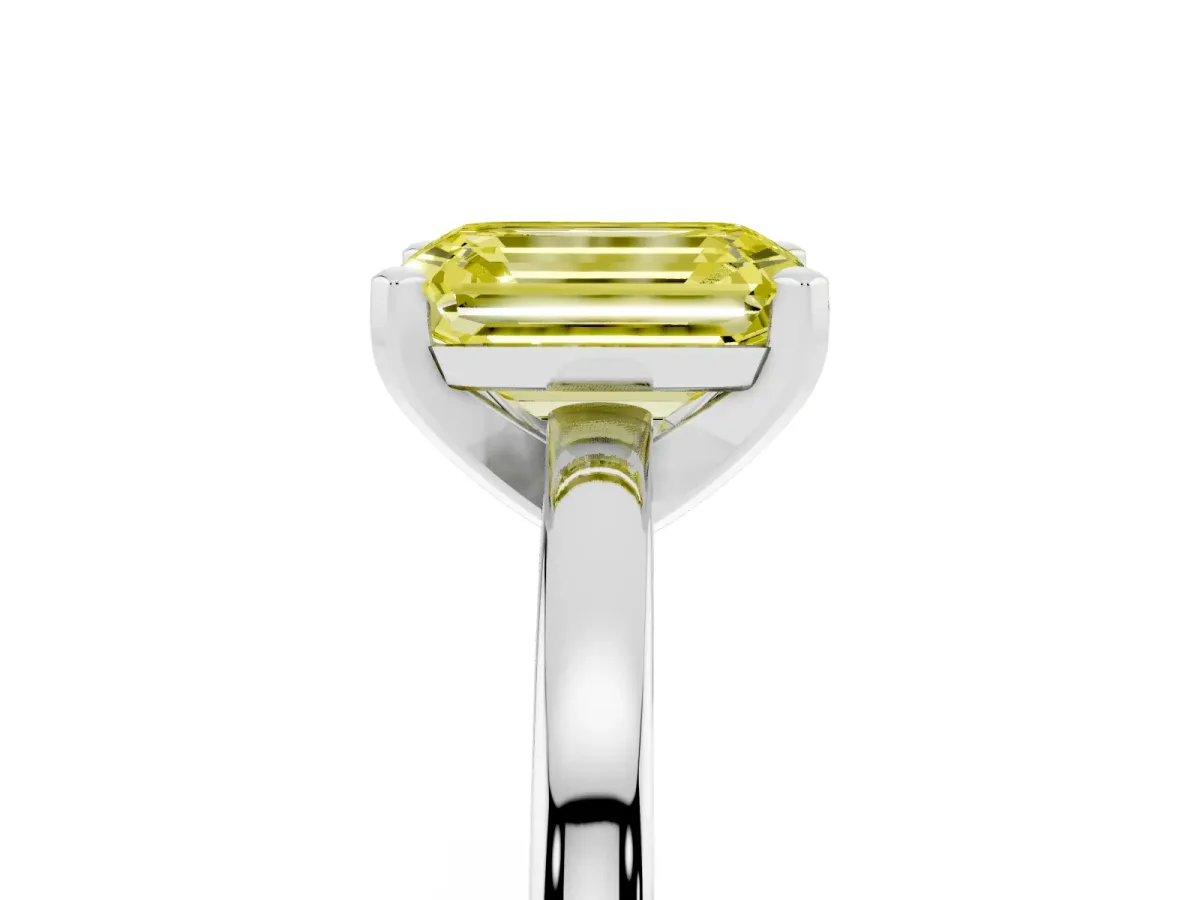 Fancy Yellow Emerald Cut Solitaire Diamond Engagement Ring with Four-Prong Setting on a Classic Band White gold