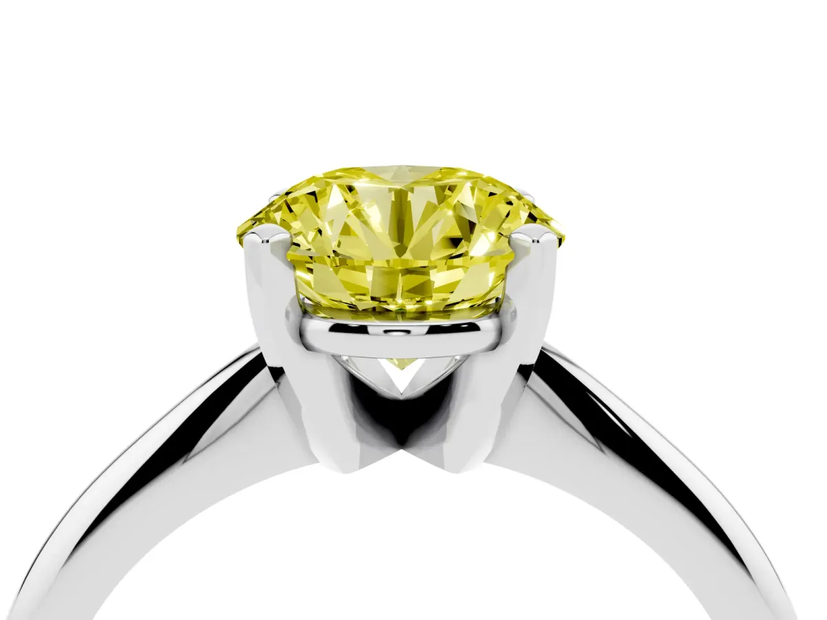 Fancy Yellow Round Cut Cut Solitaire Ring with Four-Prong Setting on a Classic Band Silver