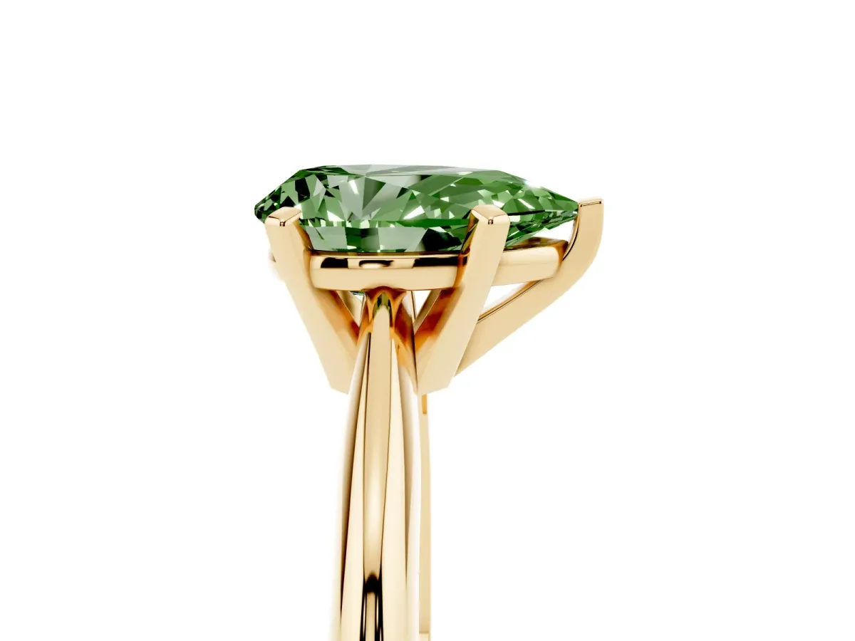 Fancy Green Pear Cut Cut Solitaire Ring with Four-Prong Setting on a Classic Band Yellow gold