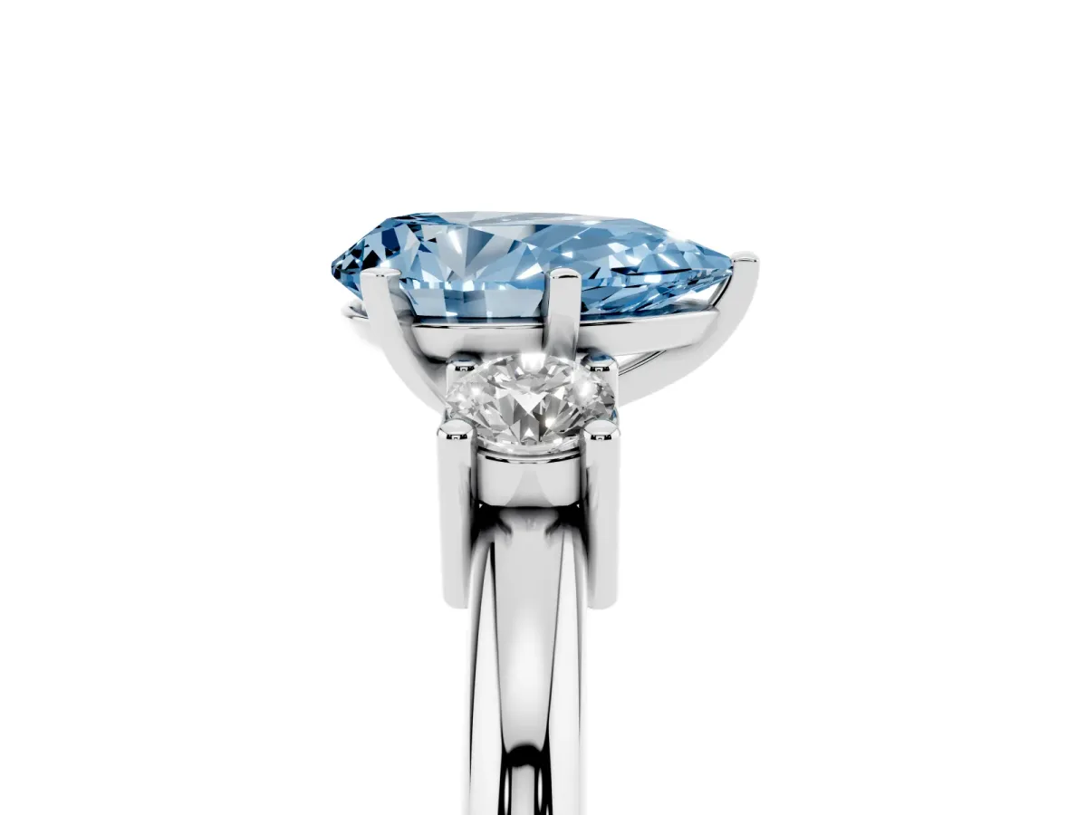 Fancy Blue Three-Stone Pear Cut Cut Diamond Solitaire with Prong Setting and Classic Band Silver