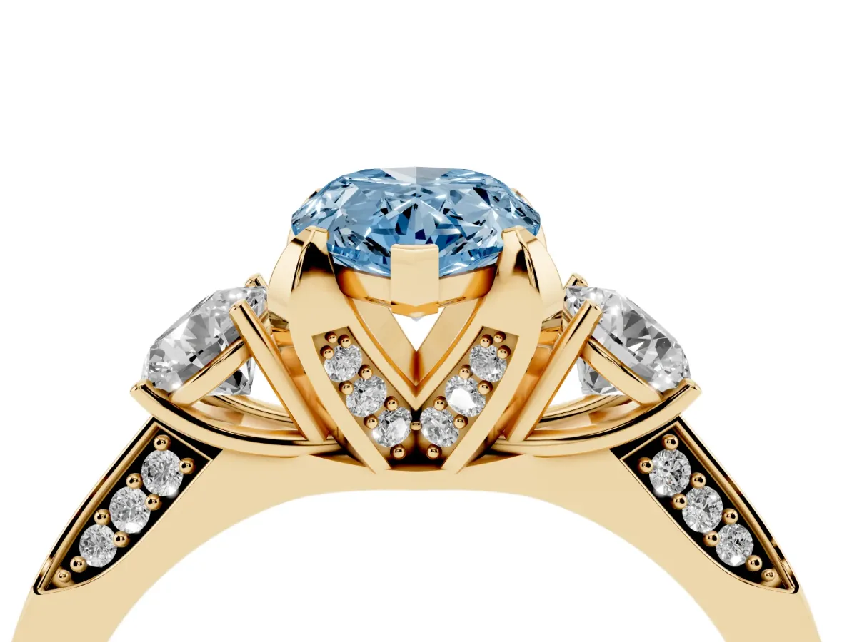 Fancy Blue Pear Cut Brilliant Three-Stone Diamond Ring with Pavé Band and Four-Prong Setting Yellow gold