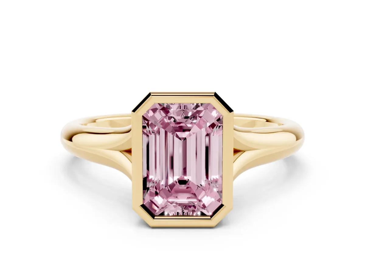 Fancy Pink Bezel Set Emerald Cut Solitaire Diamond Ring with Smooth Band Yellow gold