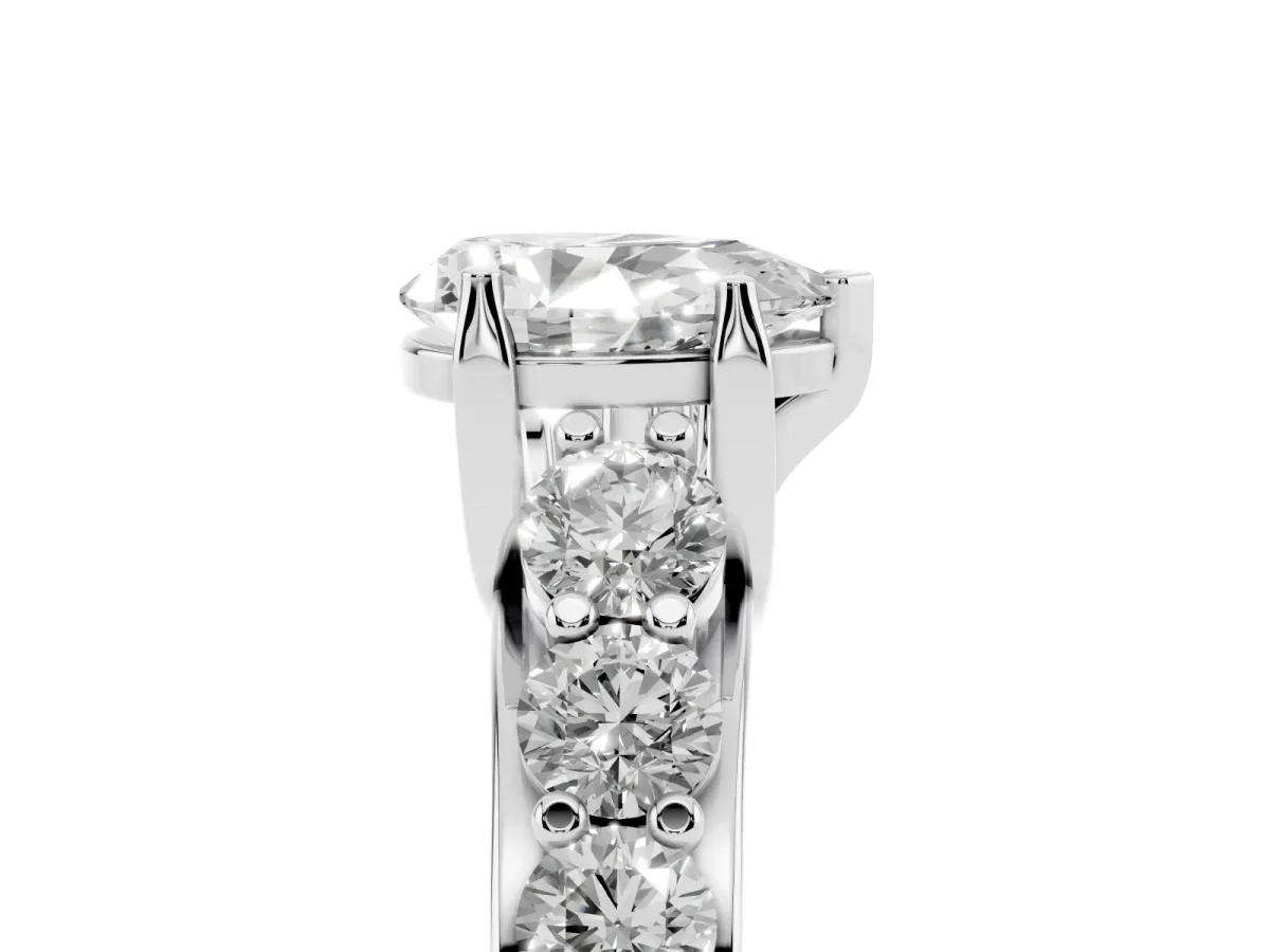 Pear Cut Diamond Engagement Ring with Pavé Band and Four-Prong Setting Platinum