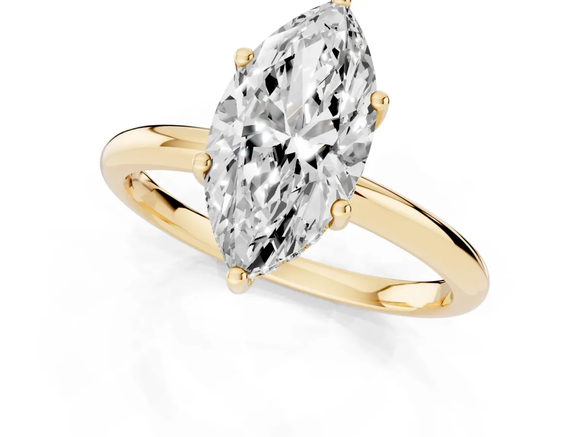Marquise Cut Cut Solitaire Engagement Ring with Four-Prong Setting and Classic Band Yellow gold