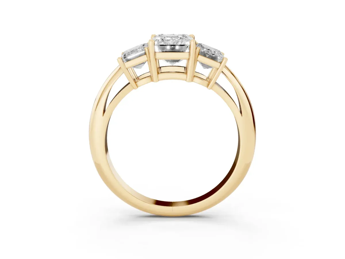 Three-Stone Emerald Cut Cut Diamond Engagement Ring with Prong Setting on a White Gold Band Yellow gold