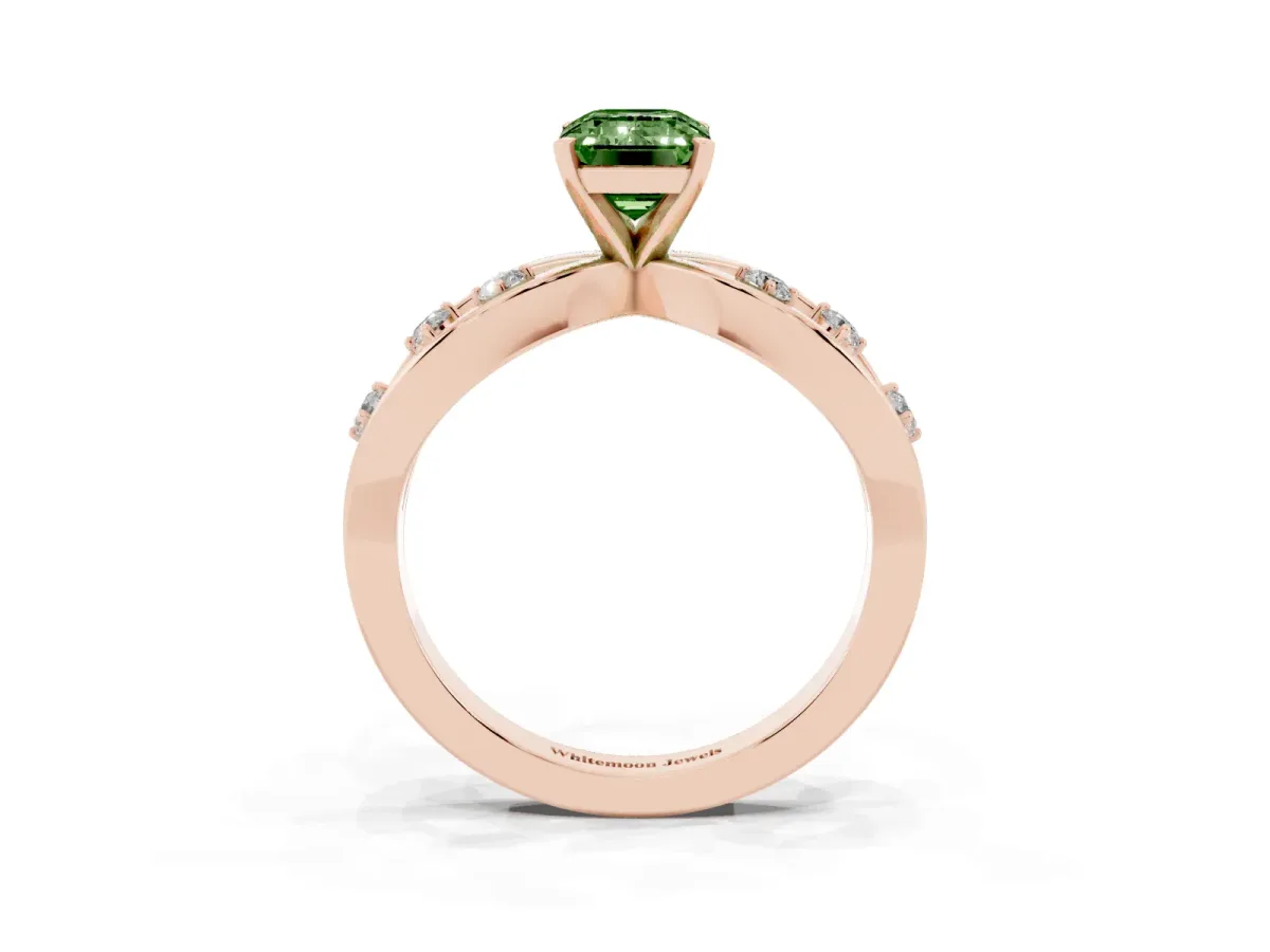 Fancy Green Emerald Cut Cut Solitaire Diamond with Side Stones on Criss-Cross Band and Four-Prong Setting Rose gold