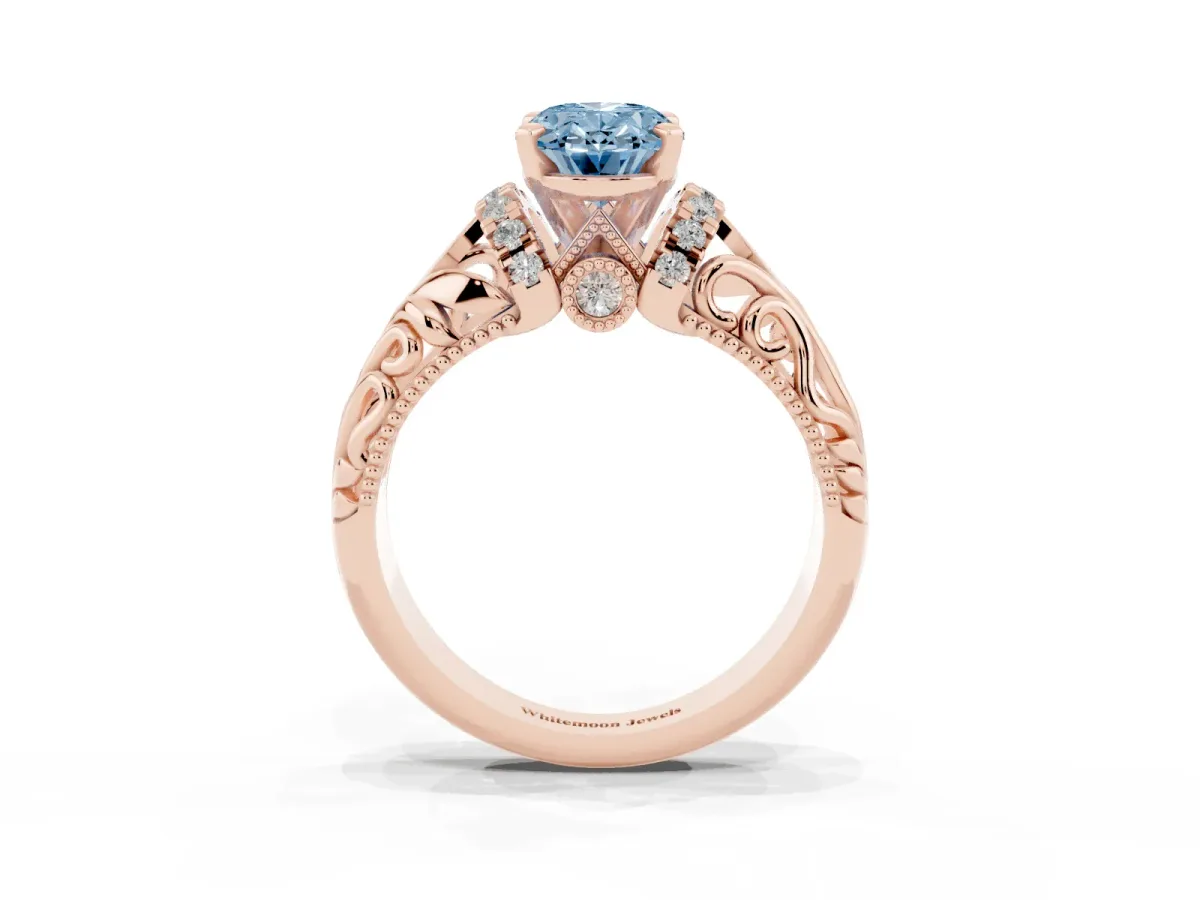Fancy Blue Oval Cut Solitaire Filigree Engagement Ring with Halo and Prong Setting Rose gold
