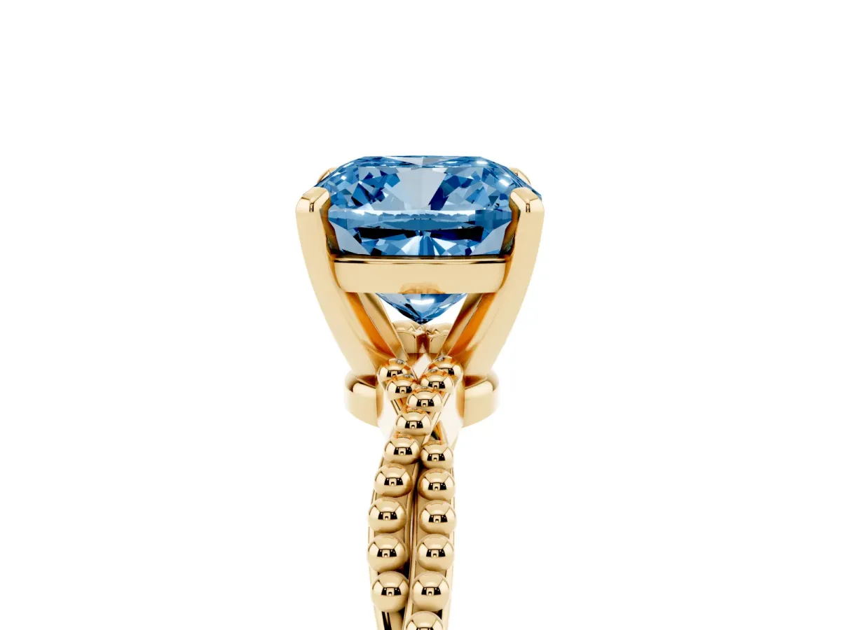 Fancy Blue Cushion Cut Solitaire Twisted Band with Bead Prong Setting Yellow gold