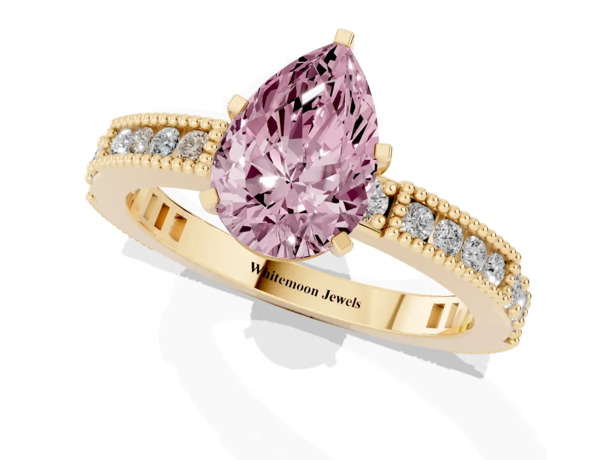 Fancy Pink Pear Cut Solitaire with Pavé Band and Four-Prong Setting Yellow gold