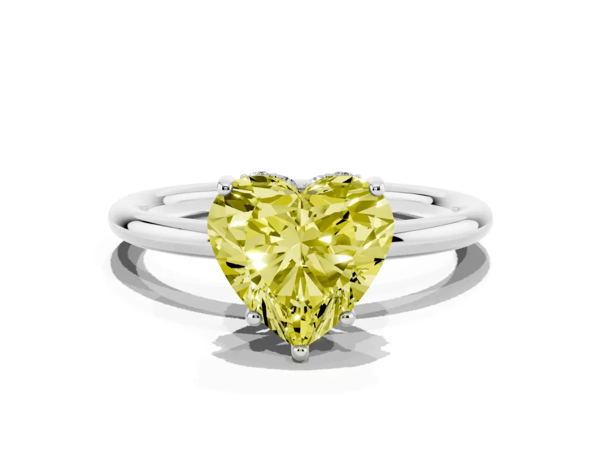 Fancy Yellow Heart Cut Solitaire Diamond Ring with a Classic Band and Four-Prong Setting Platinum