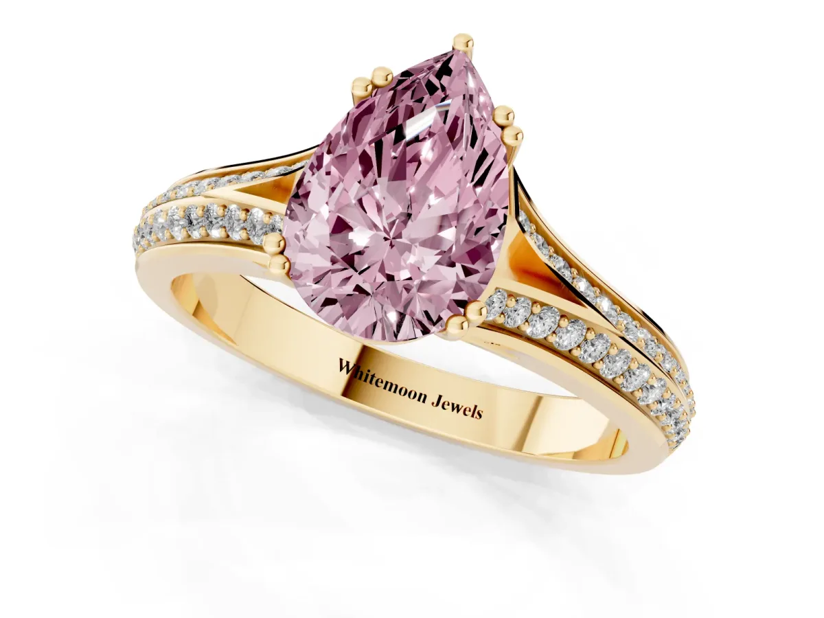 Fancy Pink Pear Cut Diamond Split Shank Engagement Ring with Pavé Band Yellow gold