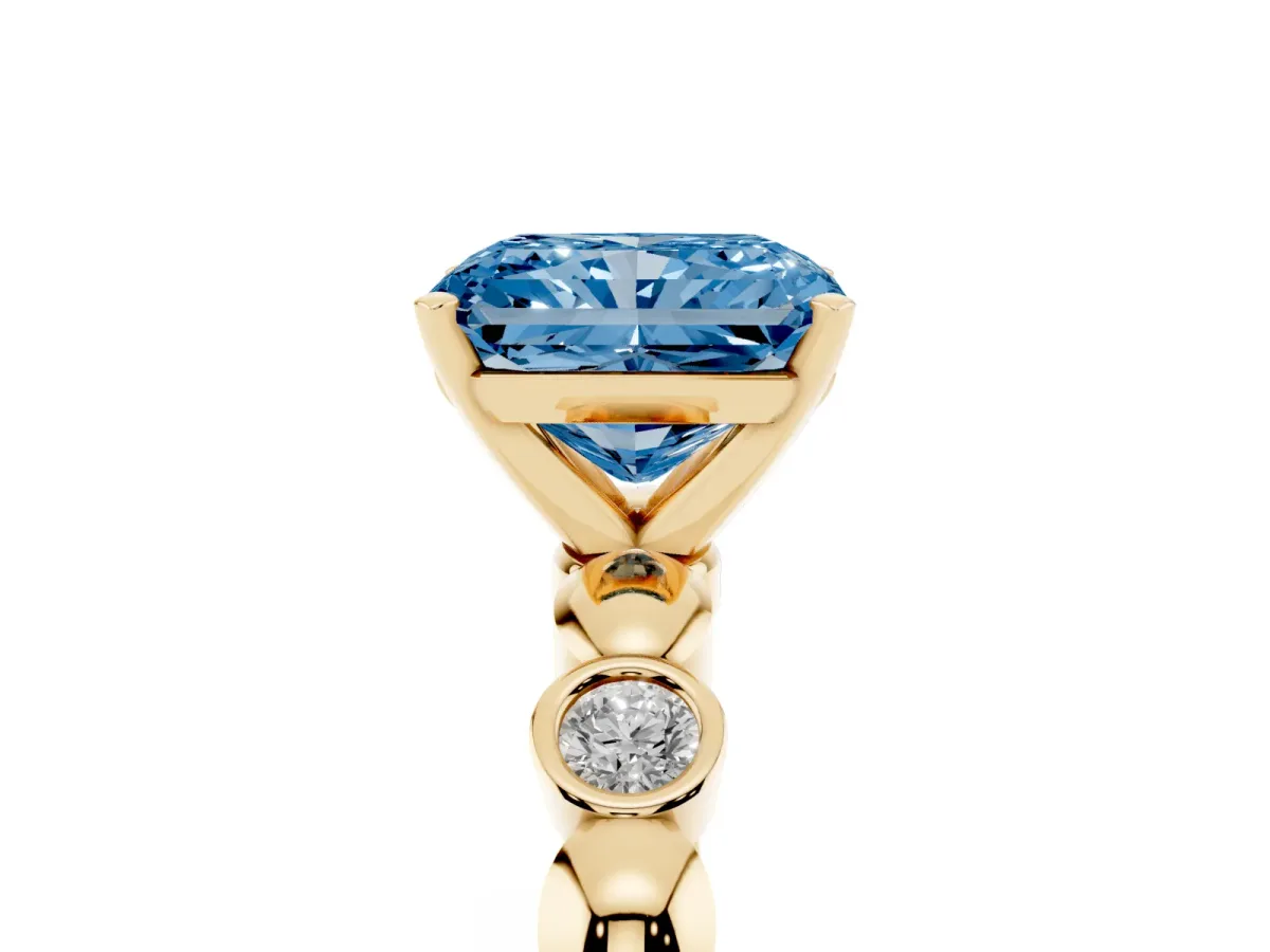 Fancy Blue Radiant Cut Solitaire Bezel-Set Diamond Ring with Beaded Band and Four-Prong Setting Yellow gold