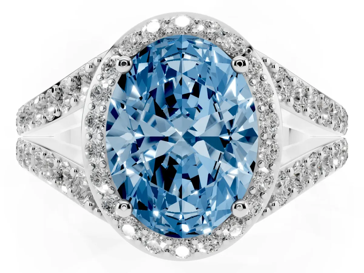 Fancy Blue Oval Cut Diamond Split Shank Halo Ring with Four-Prong Setting Silver