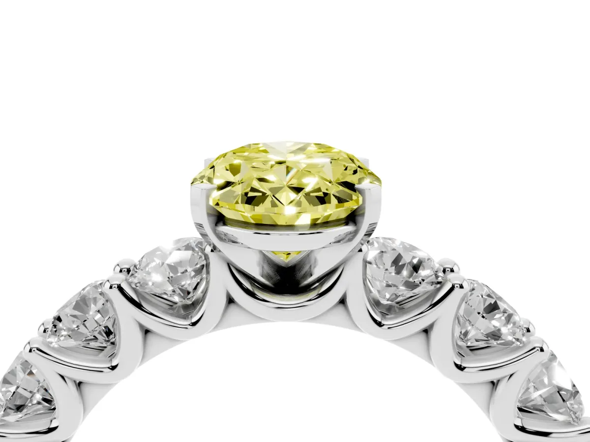 Fancy Yellow Oval Cut Diamond Prong Setting with Side Stones on a Pave Band Silver