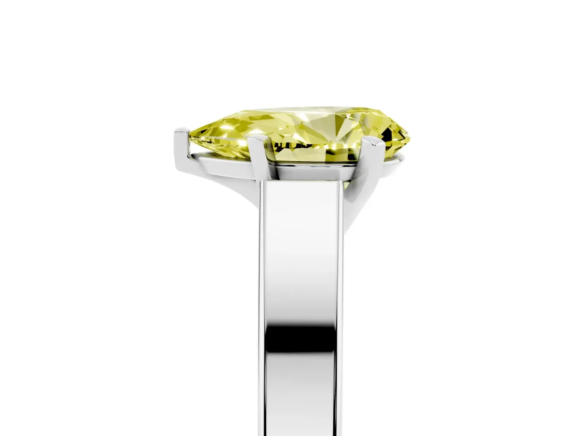 Fancy Yellow Pear Cut Solitaire Engagement Ring with Four-Prong Setting and Tapered Band Silver