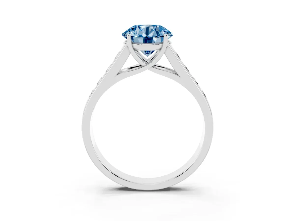 Fancy Blue Round Cut Solitaire Channel-Set Diamond Engagement Ring with Four-Prong Setting Silver