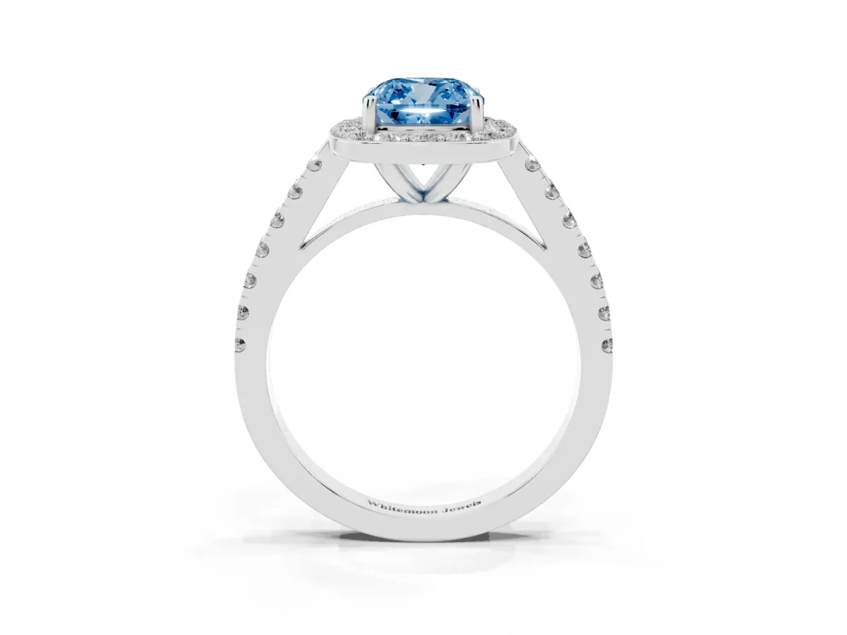 Fancy Blue Cushion Cut Diamond Halo Ring with Round Pavé Split Shank and Prong Setting Silver
