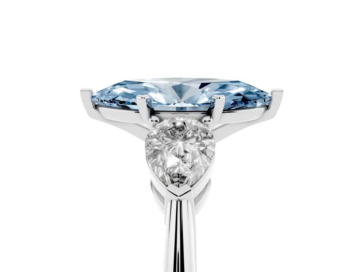 Fancy Blue Three-Stone Marquise Cut Diamond Ring with Pear Side Stones and Four-Prong Setting Silver