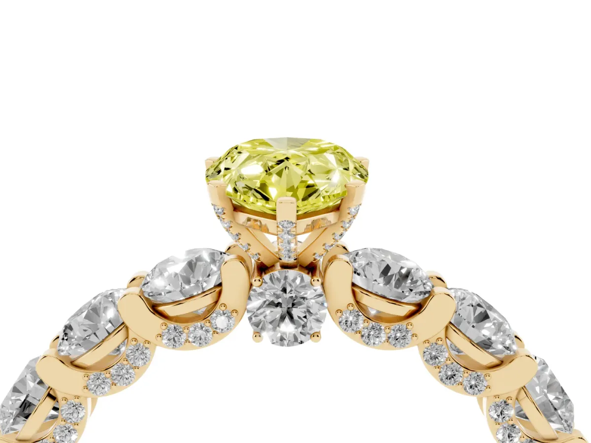 Fancy Yellow Pear Cut Diamond Side Stone Engagement Ring with Four-Prong Setting Yellow gold