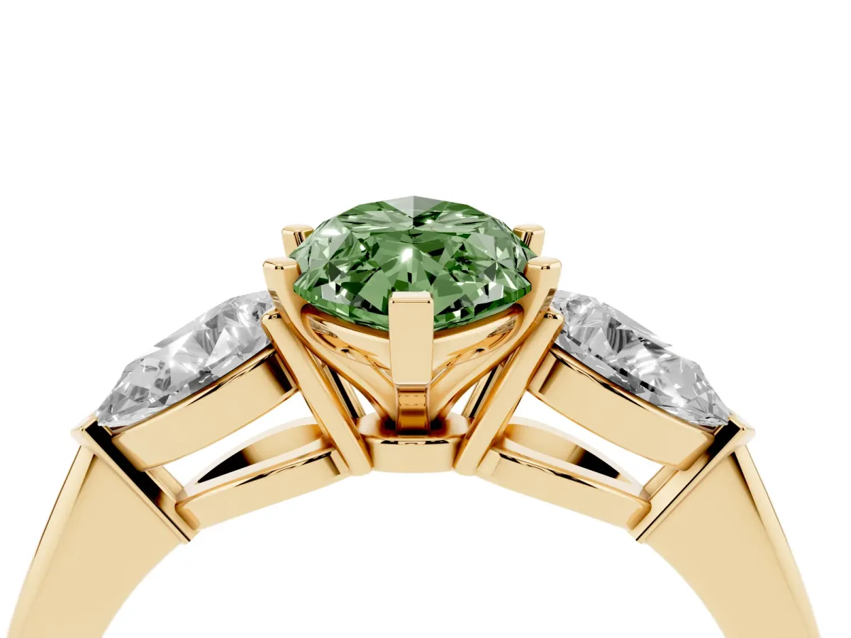 Fancy Green Three-Stone Marquise Cut Diamond Ring with Pear Side Stones and Four-Prong Setting Yellow gold
