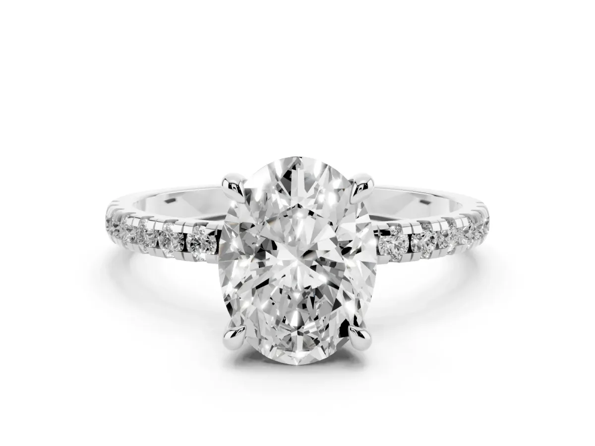 Oval Cut Diamond Brilliant Solitaire Ring with Pavé Band and Four-Prong Setting Silver