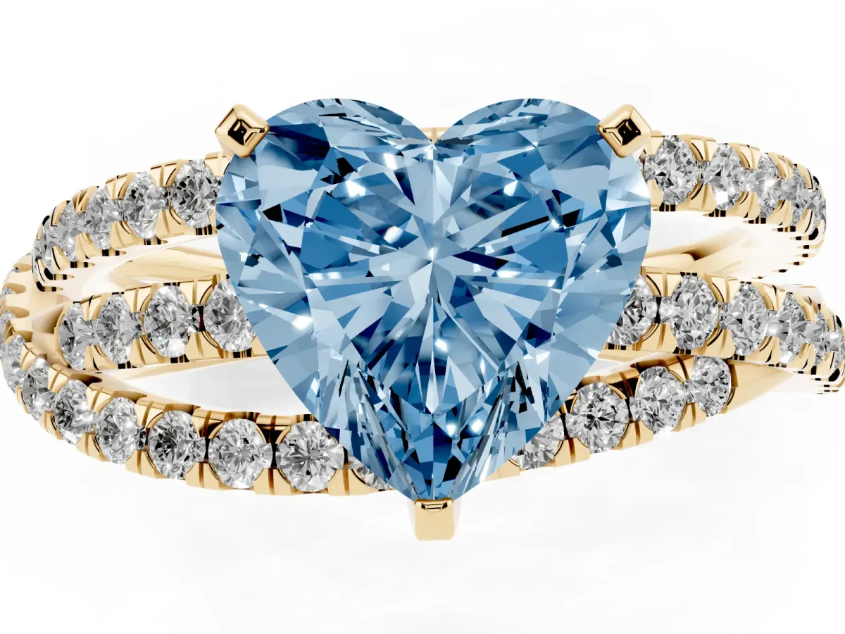 Fancy Blue Heart Cut Solitaire Twist Band with Pavé Setting and Four-Prong Setting Yellow gold