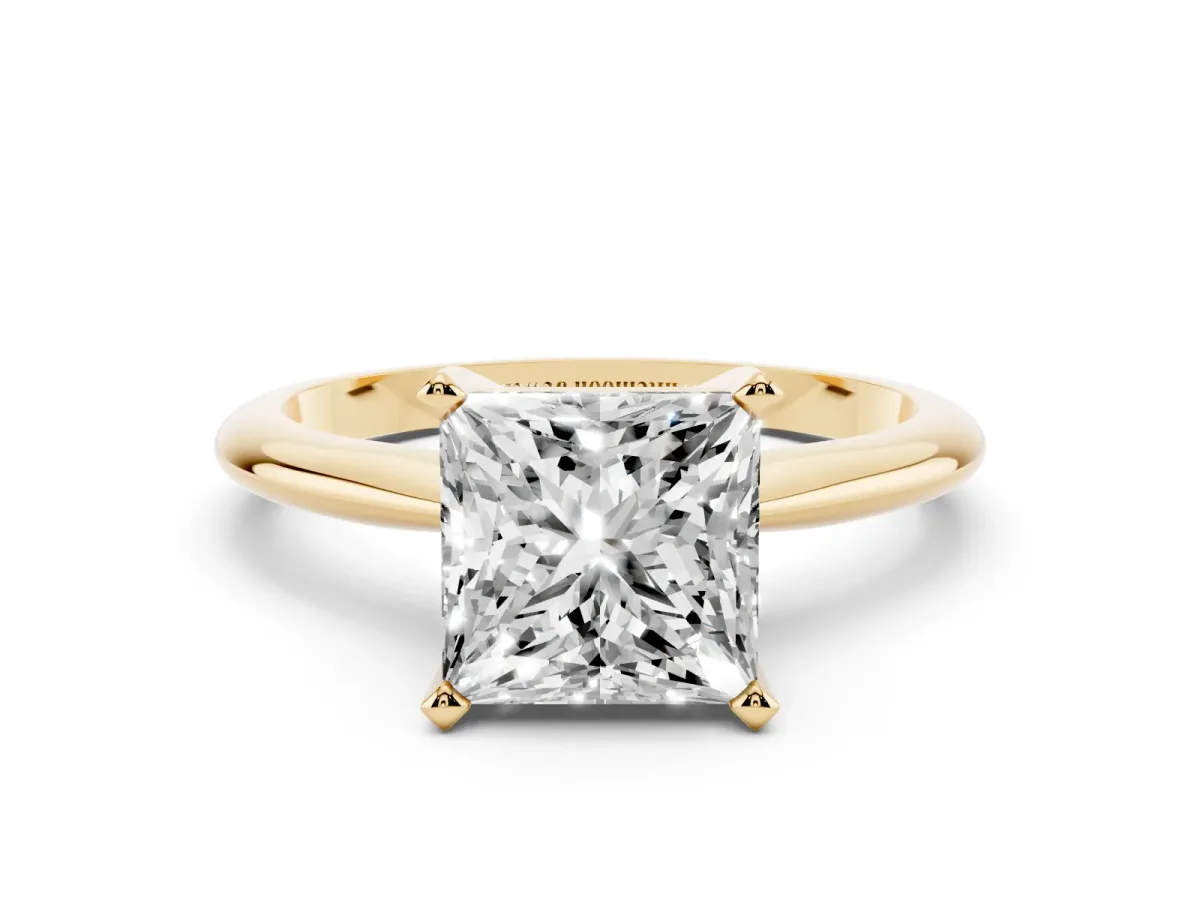 Princess Cut Cut Solitaire Ring with Four-Prong Setting on a Classic Band Yellow gold