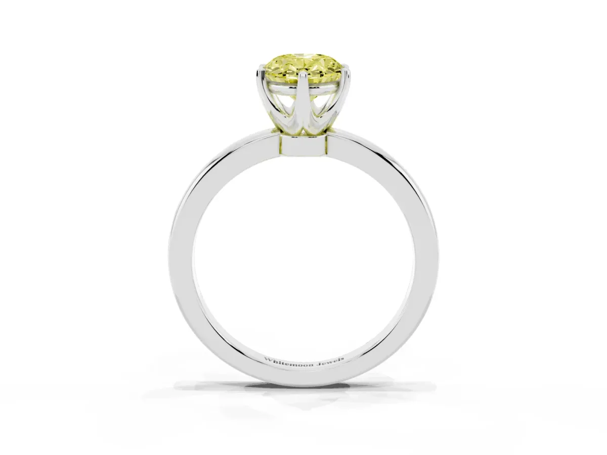 Fancy Yellow Oval Cut Solitaire Diamond Ring with Six-Prong Setting on a Classic Band Silver