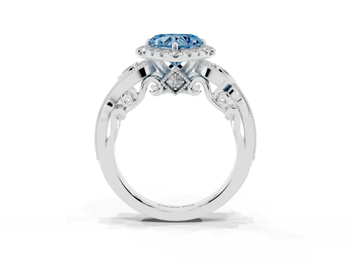 Fancy Blue Heart Cut Halo Diamond Ring with Milgrain and Bezel Accents on a Split Shank Band Platinum
